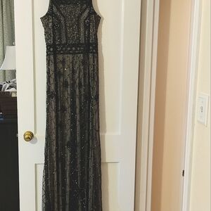 Adrianna Papell beaded evening gown. Size 14, black beaded overlay, tan lining.